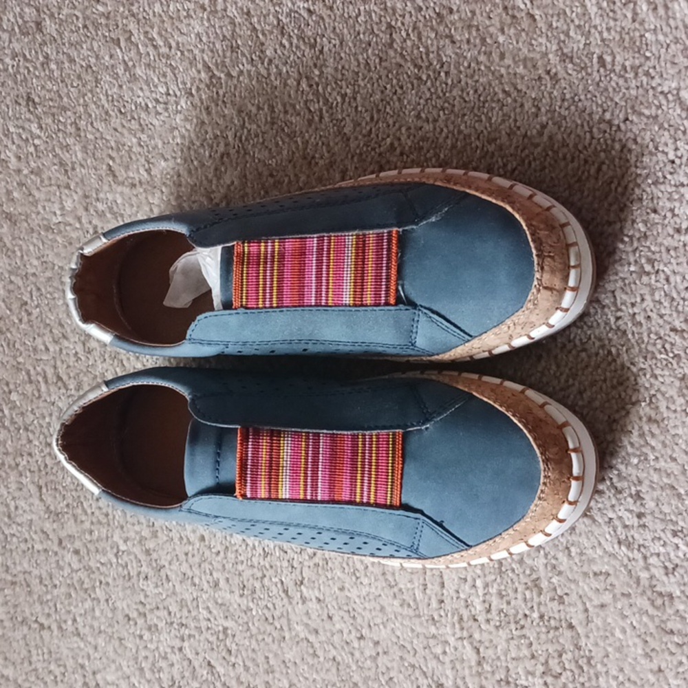 Slip-ons, never worn in size 7, deep blue.